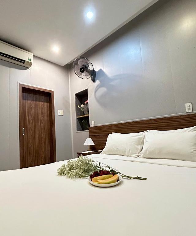 Postel nebo postele na pokoji v ubytování BeSea Hotel