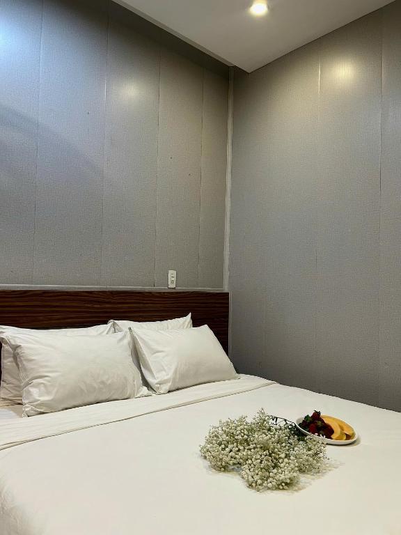 Postel nebo postele na pokoji v ubytování BeSea Hotel