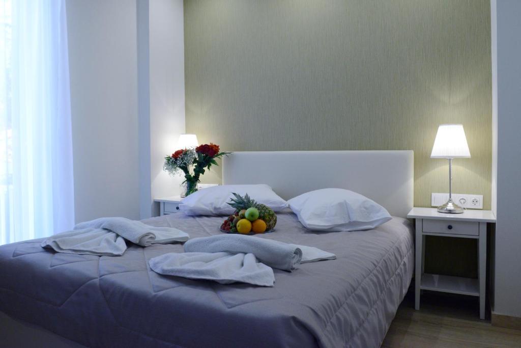 Uma cama ou camas num quarto em Phidias Hotel by Oniro