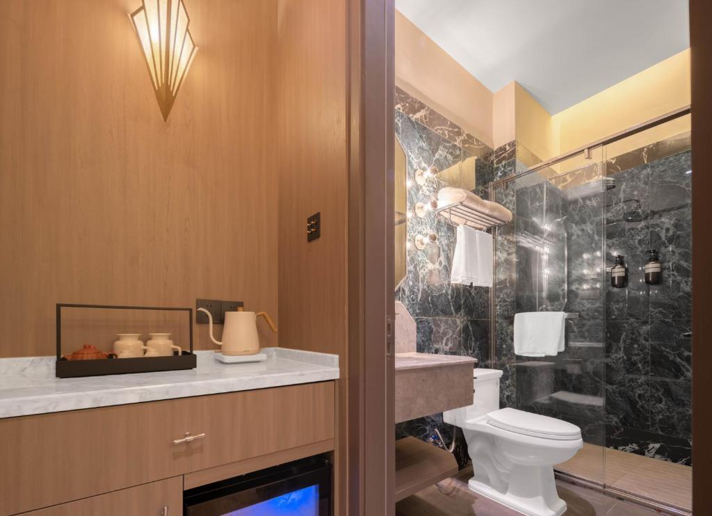 Koupelna v ubytování Mudita Hotel