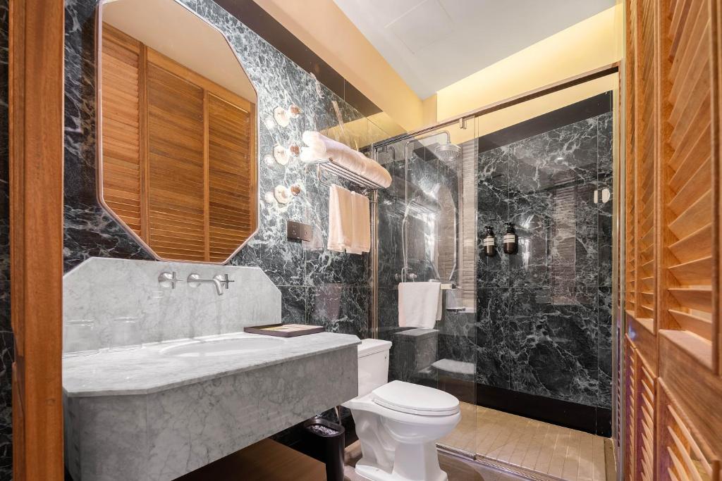 Koupelna v ubytování Mudita Hotel