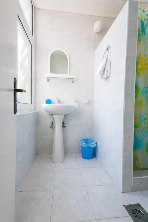 Koupelna v ubytování Rooms Molabeciri