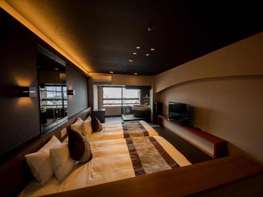 Posezení v ubytování LiVEMAX RESORT Aki Miyajima