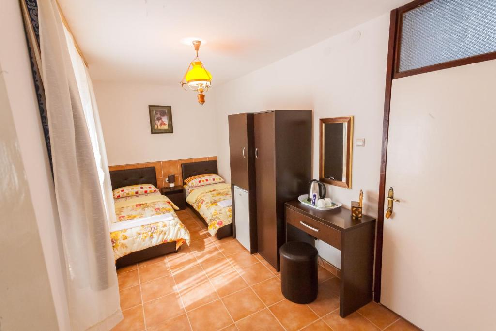 Postel nebo postele na pokoji v ubytování Rooms Molabeciri