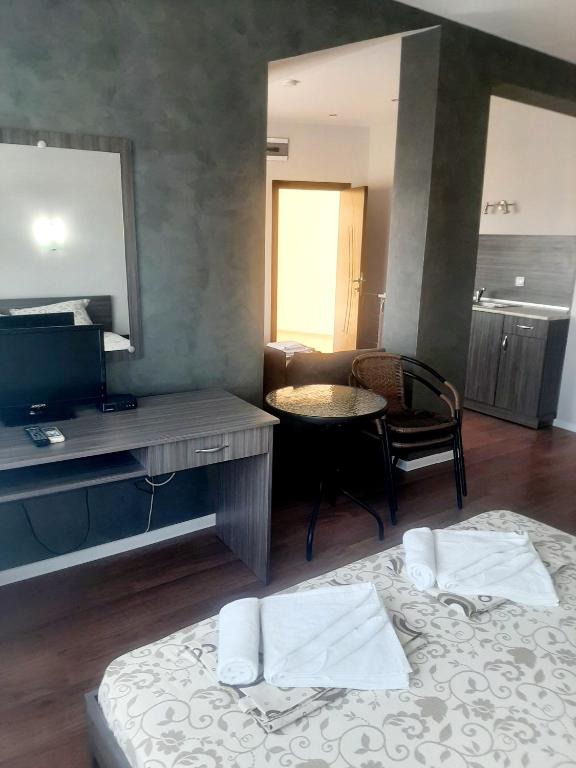 Postel nebo postele na pokoji v ubytování Hotel Ray