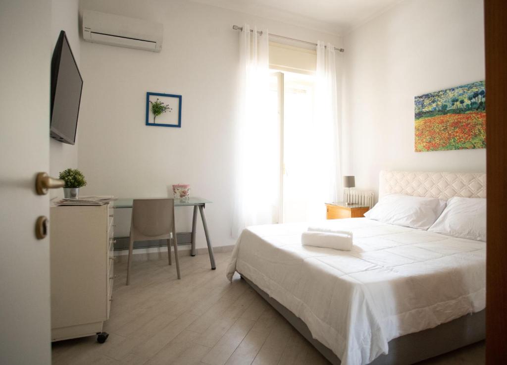Postel nebo postele na pokoji v ubytování Armonie Centro Lecce