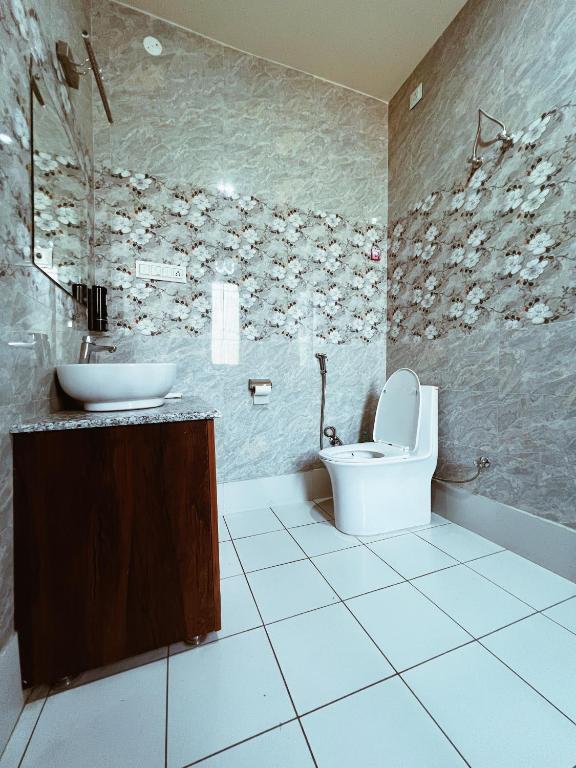 Koupelna v ubytování Appas Hotel
