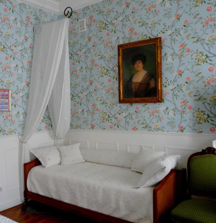 Postel nebo postele na pokoji v ubytování Hôtel de l'Abeille