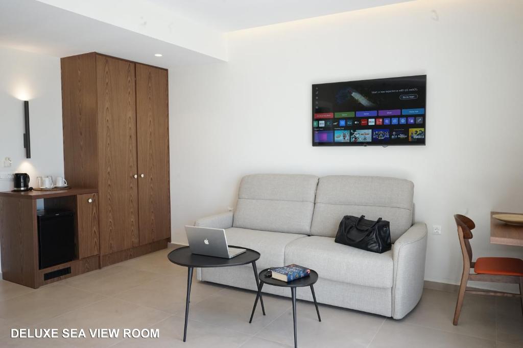 TV a/nebo společenská místnost v ubytování Lato hotel