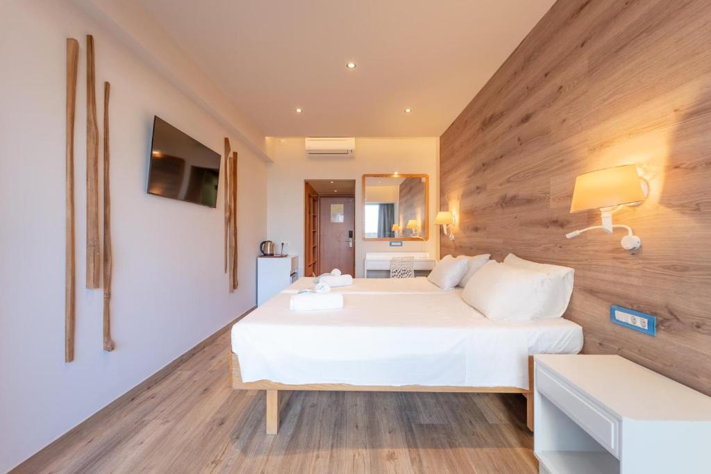 Telewizja i/lub zestaw kina domowego w obiekcie Arte Hotel