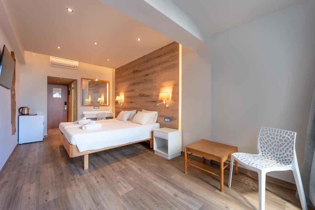 Łóżko lub łóżka w pokoju w obiekcie Arte Hotel