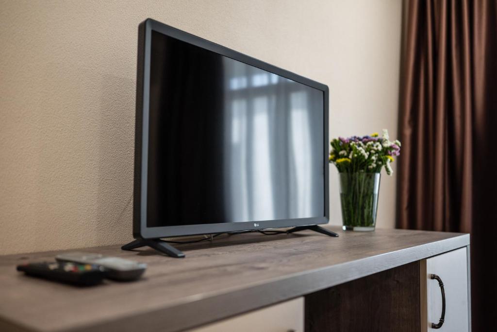 TV a/nebo společenská místnost v ubytování Weekend Family Hotel