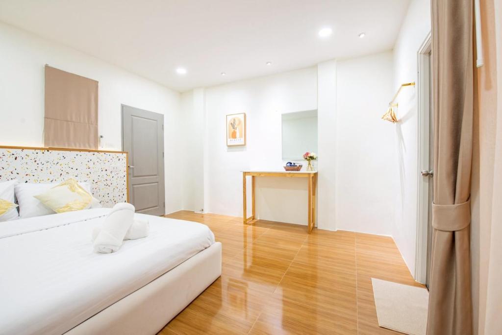 Postel nebo postele na pokoji v ubytování Nimo villa