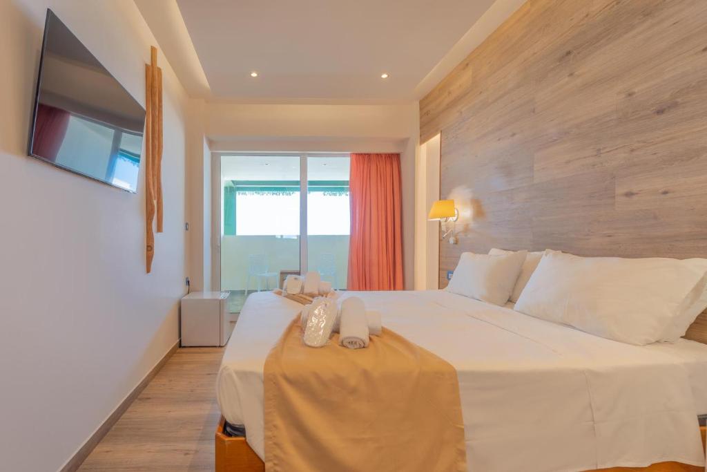 Łóżko lub łóżka w pokoju w obiekcie Arte Hotel