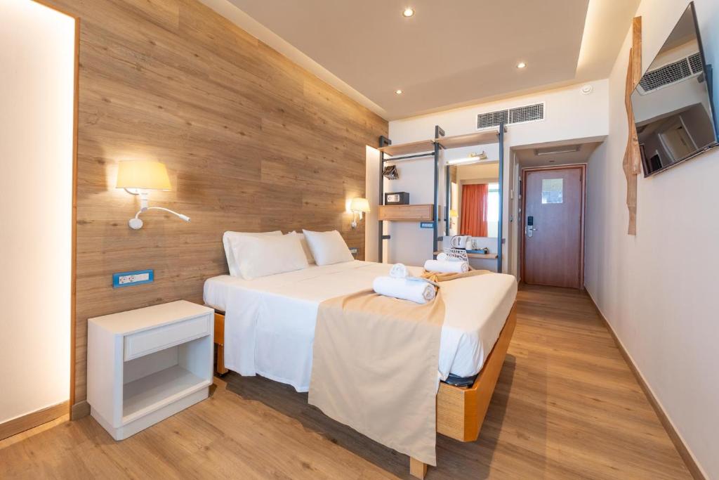 Łóżko lub łóżka w pokoju w obiekcie Arte Hotel