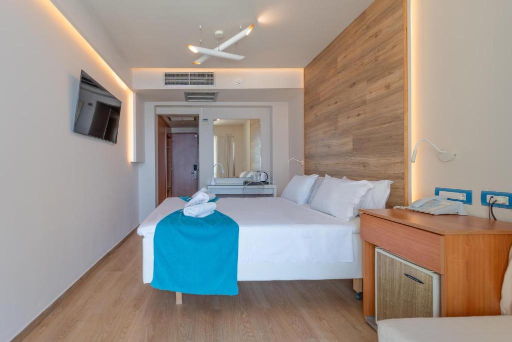 Łóżko lub łóżka w pokoju w obiekcie Arte Hotel