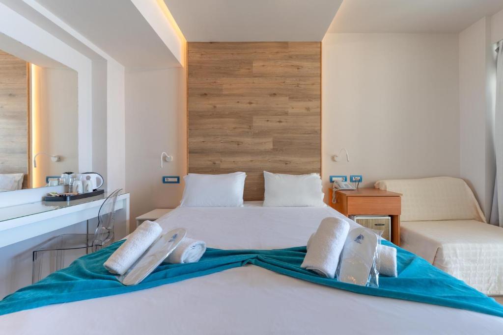 Łóżko lub łóżka w pokoju w obiekcie Arte Hotel