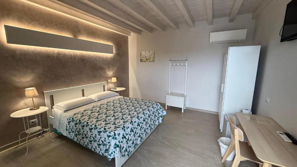 Postel nebo postele na pokoji v ubytování La corte di Emma e Ale