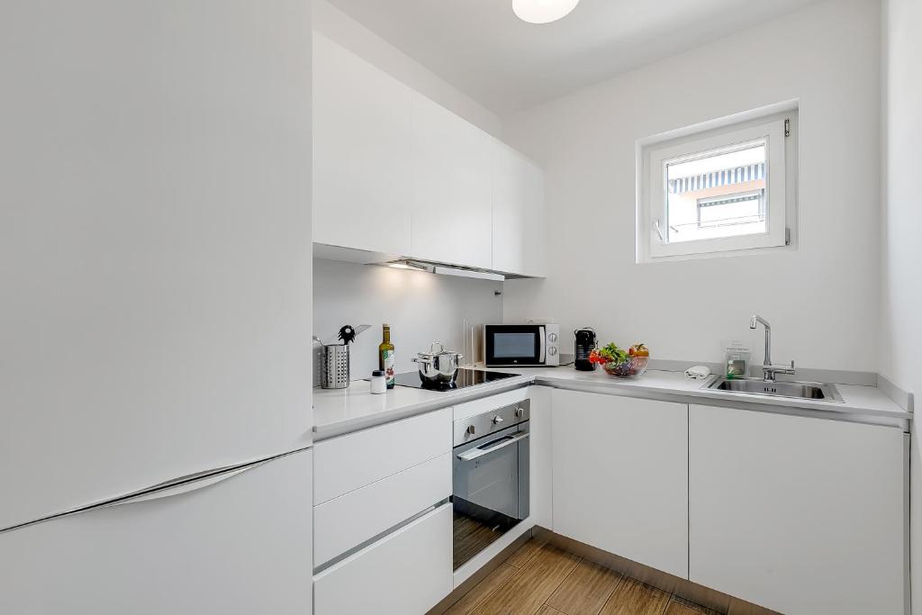 مطبخ أو مطبخ صغير في Viganello Modern Apartments