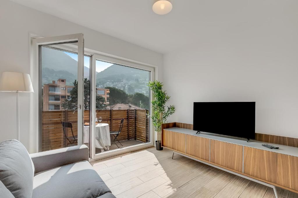 تلفاز و/أو أجهزة ترفيهية في Viganello Modern Apartments