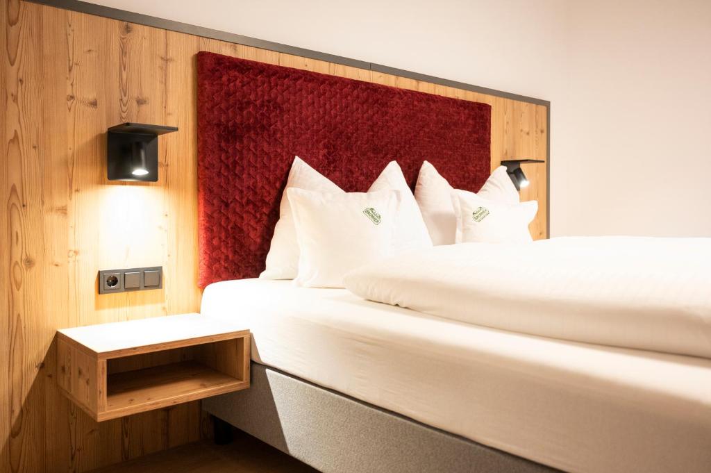 Postel nebo postele na pokoji v ubytování Hotel Brunner - Reiteralm