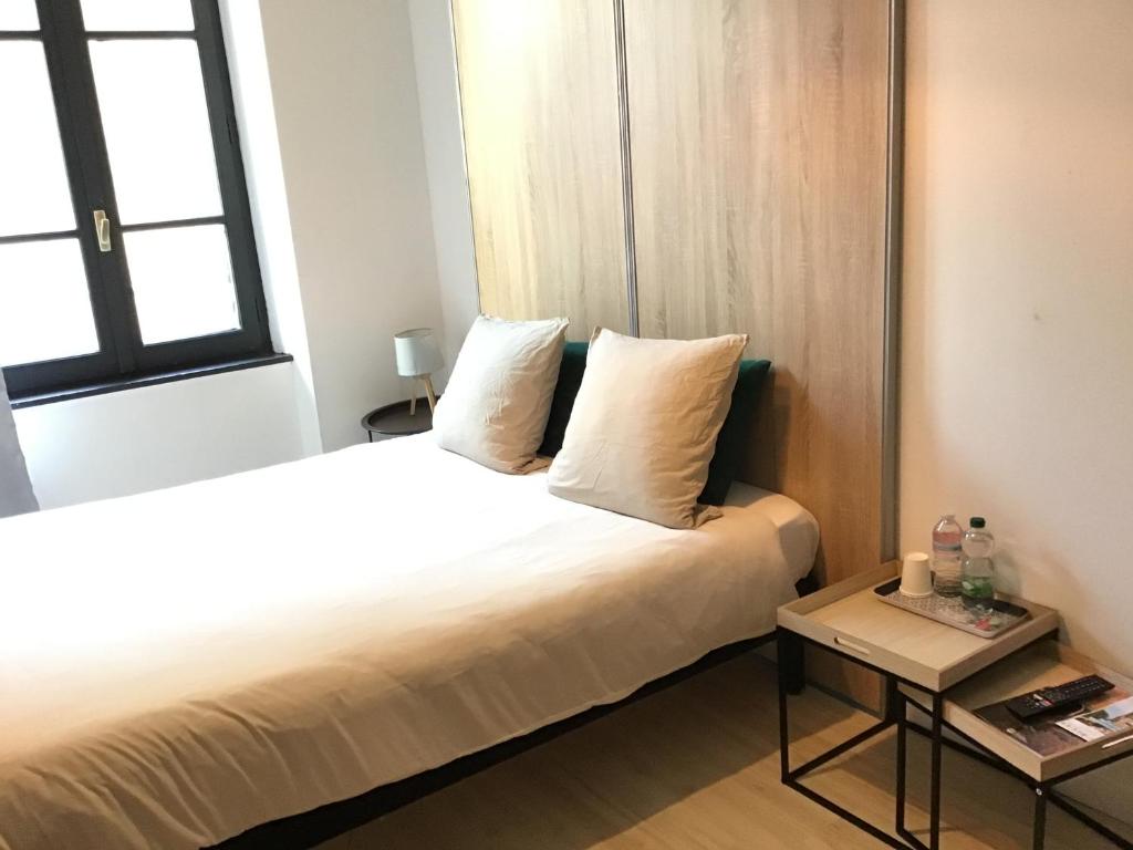 Postel nebo postele na pokoji v ubytování Chambre Cosy 2