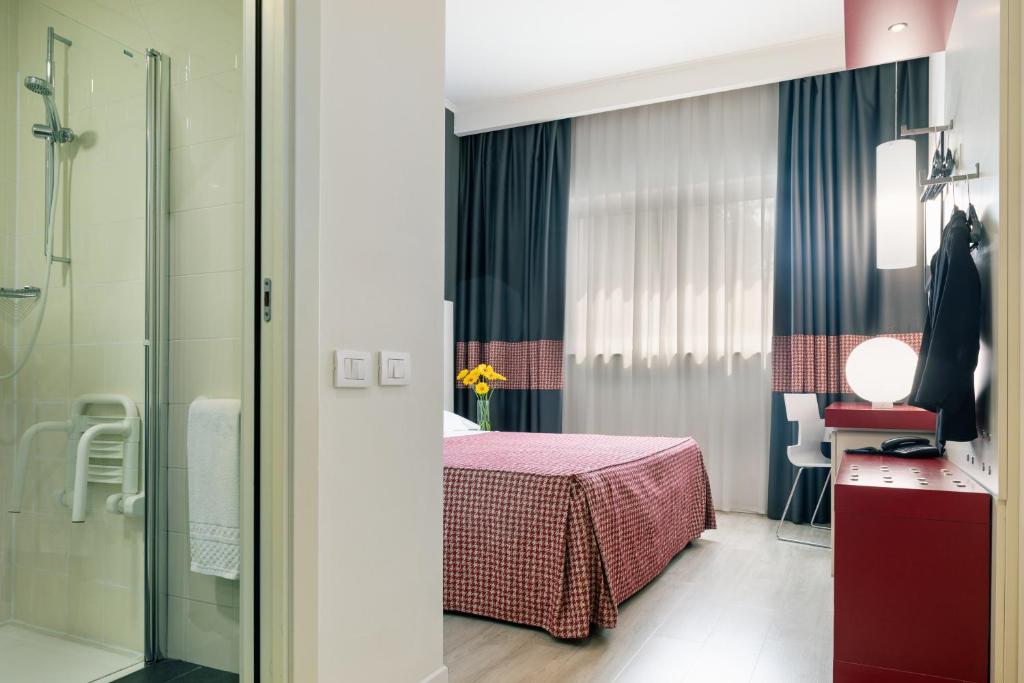 Posteľ alebo postele v izbe v ubytovaní MICHELINO 75 by the Sydney Hotel