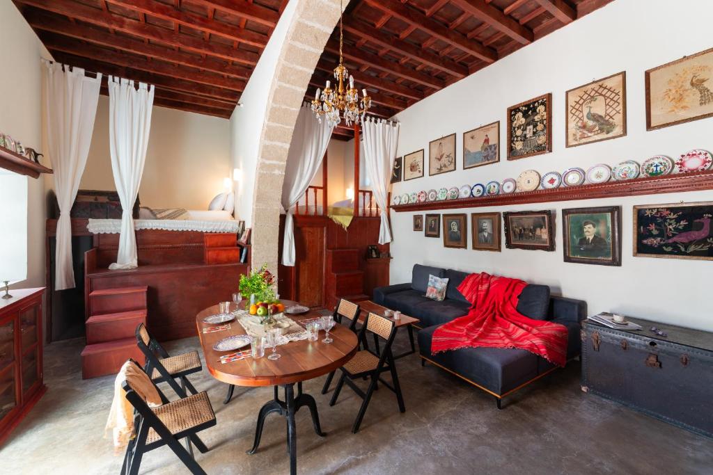 a living room with a couch and a table at Via Vasileia 6 in Kattavía