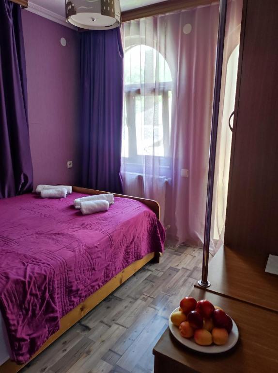 Letto o letti in una camera di Ushba House