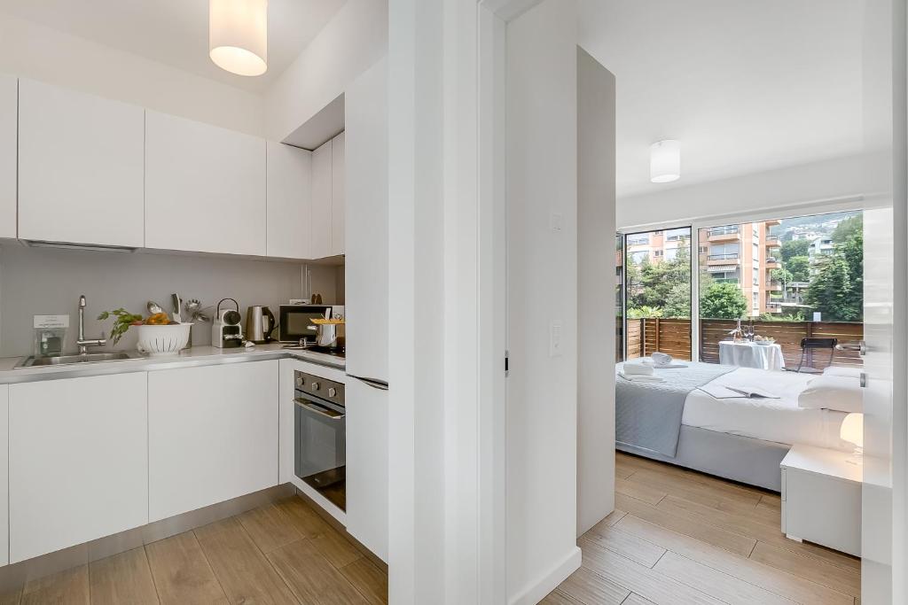 مطبخ أو مطبخ صغير في Viganello Modern Apartments