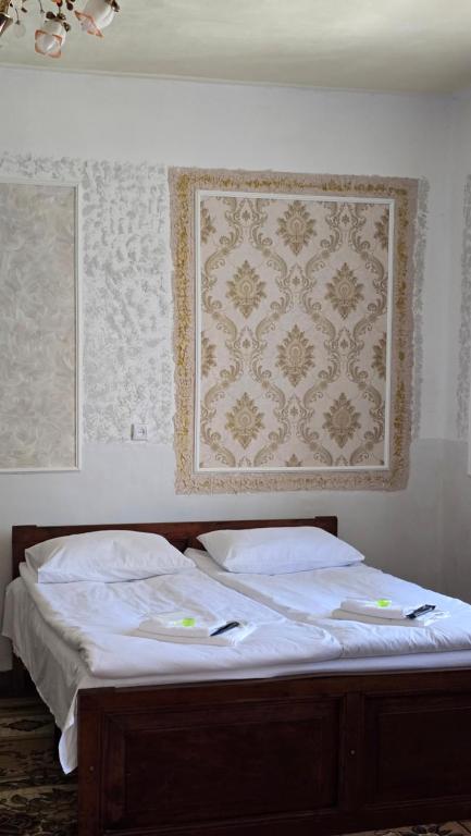 Postel nebo postele na pokoji v ubytování Sanahin Heritage