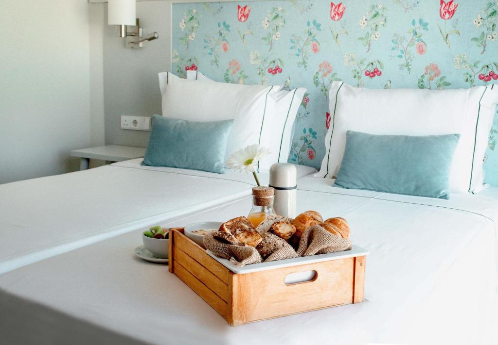 Кровать или кровати в номере Agua Hotels Alvor Jardim