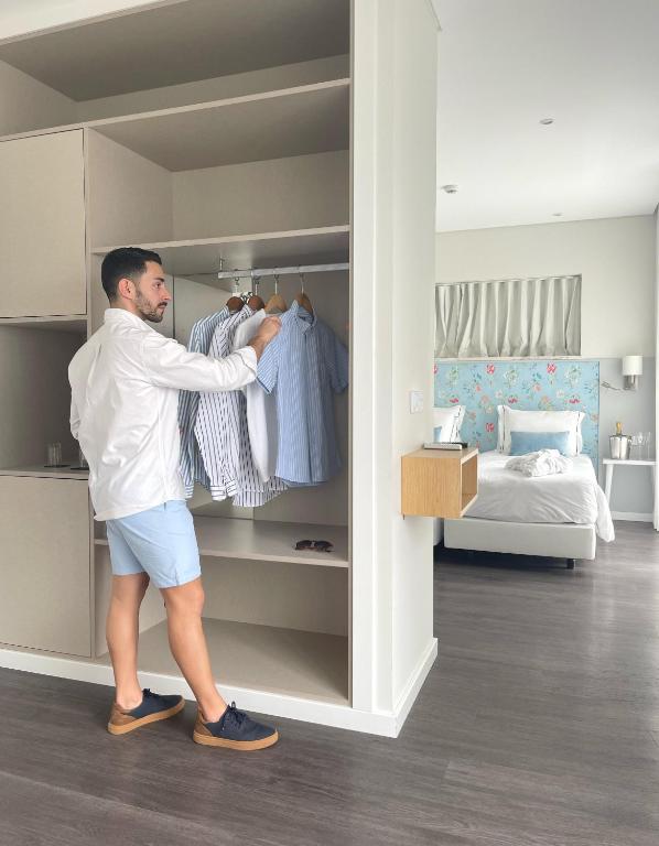 Кровать или кровати в номере Agua Hotels Alvor Jardim