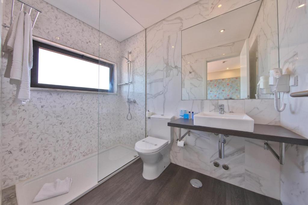 Ванная комната в Agua Hotels Alvor Jardim