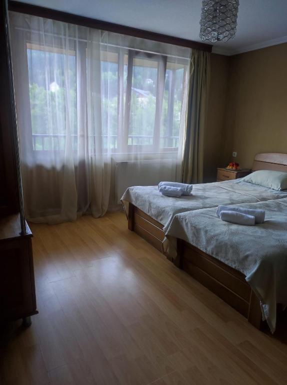 Letto o letti in una camera di Ushba House