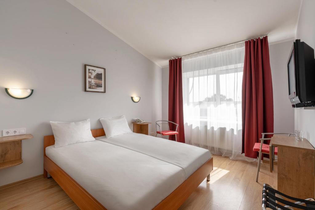 TV a/nebo společenská místnost v ubytování Apart Hotel Tomo FREE PARKING