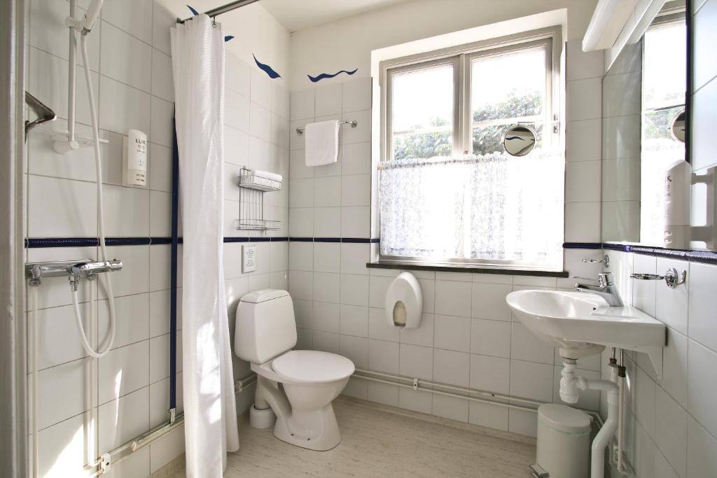 Koupelna v ubytování Hotell Laurentius