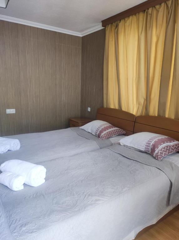 Letto o letti in una camera di Ushba House