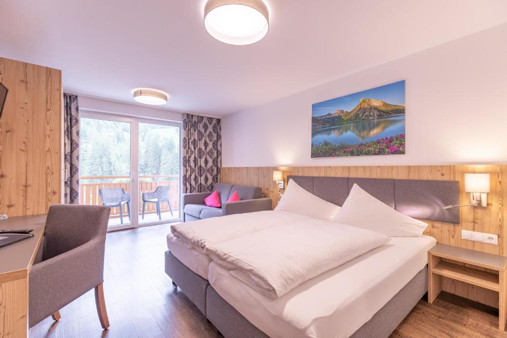 Voodi või voodid majutusasutuse Haus Sattelblick toas
