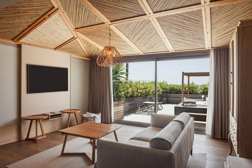 A seating area at Day One Beach Resort & SPA - Adult Only