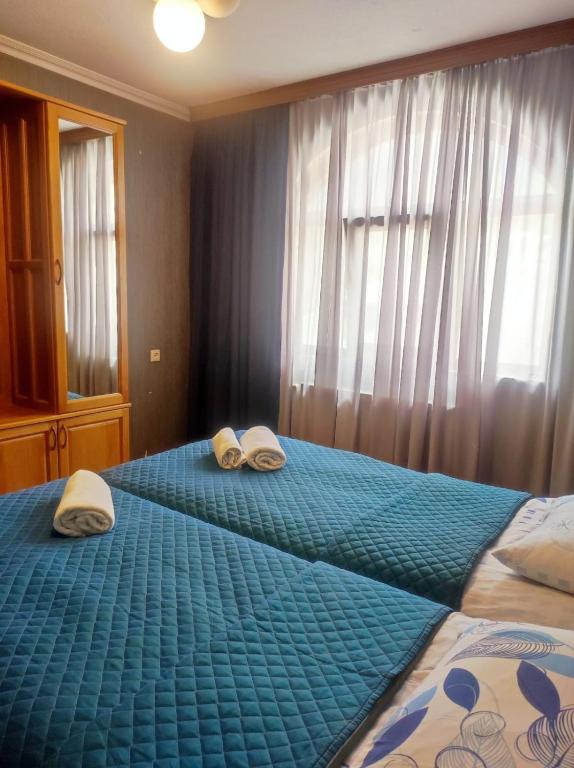 Letto o letti in una camera di Ushba House