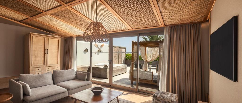 A seating area at Day One Beach Resort & SPA - Adult Only