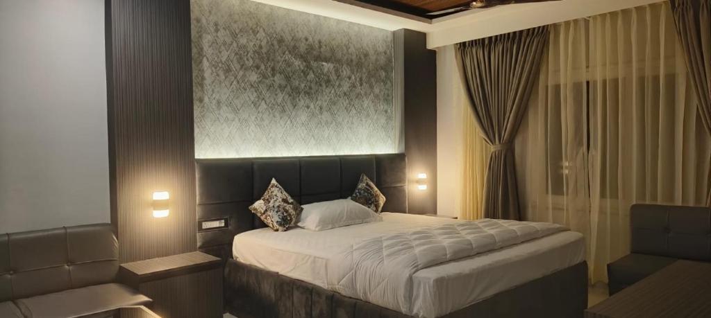 Katil atau katil-katil dalam bilik di Hotel Valley Inn