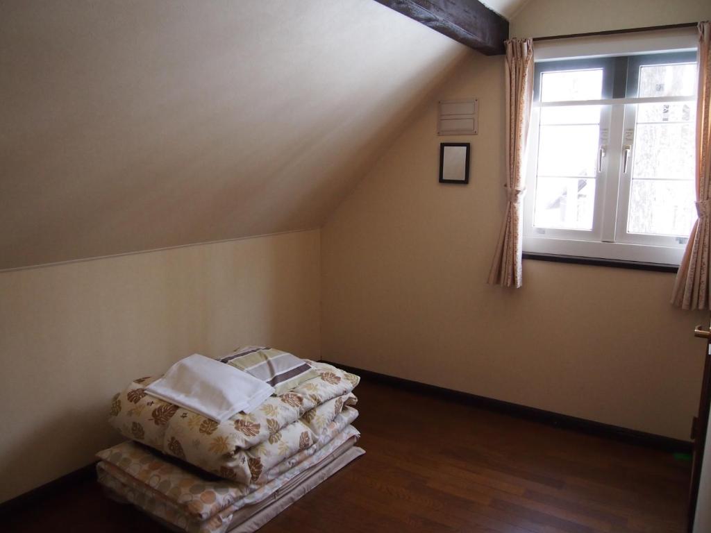 Postel nebo postele na pokoji v ubytování Guesthouse Canterbury