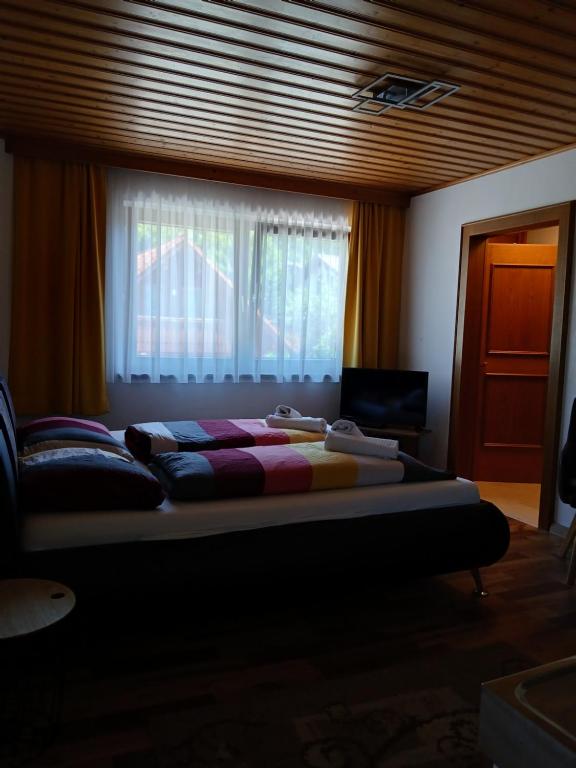 Postel nebo postele na pokoji v ubytování Mani‘s Appartements