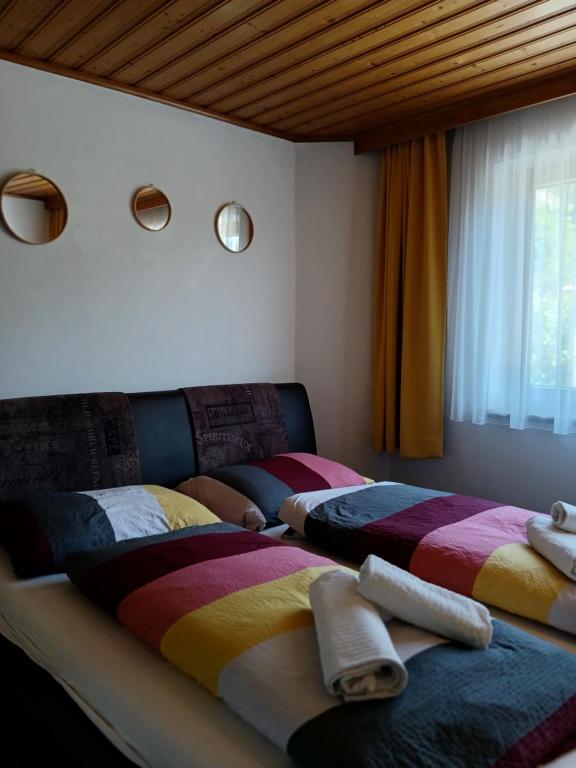 Postel nebo postele na pokoji v ubytování Mani‘s Appartements