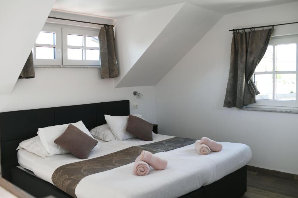 Postel nebo postele na pokoji v ubytování B&B Vidmar, Lesce-Bled