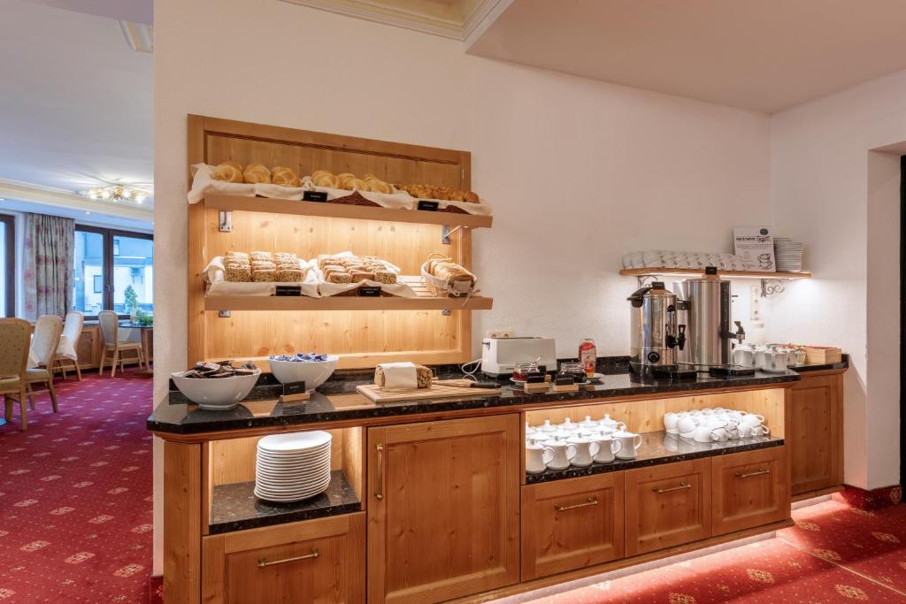Kuchyň nebo kuchyňský kout v ubytování Heart Hotel Arlberg