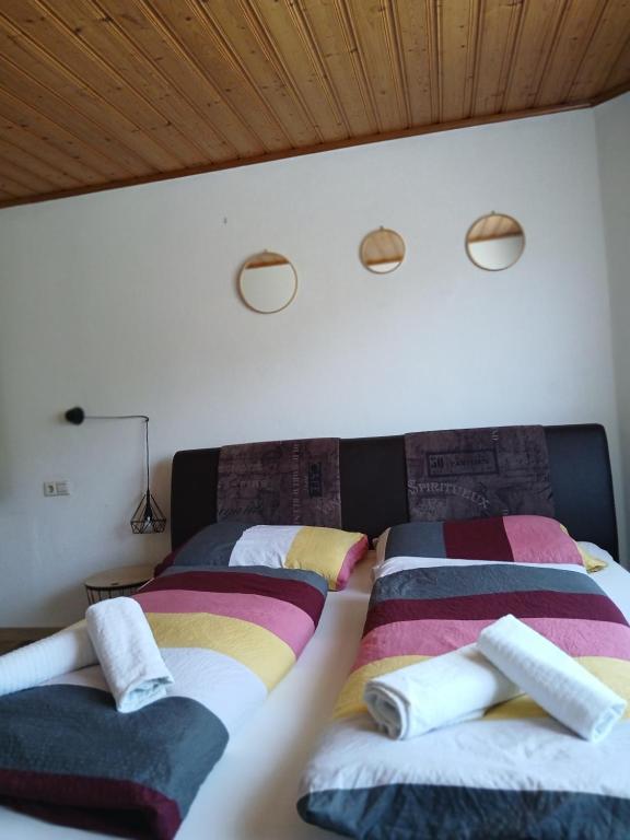 Postel nebo postele na pokoji v ubytování Mani‘s Appartements