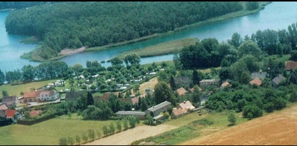 an aerial view of a town next to a river at Ferienwohnung Fam.Stecher in Malschwitz